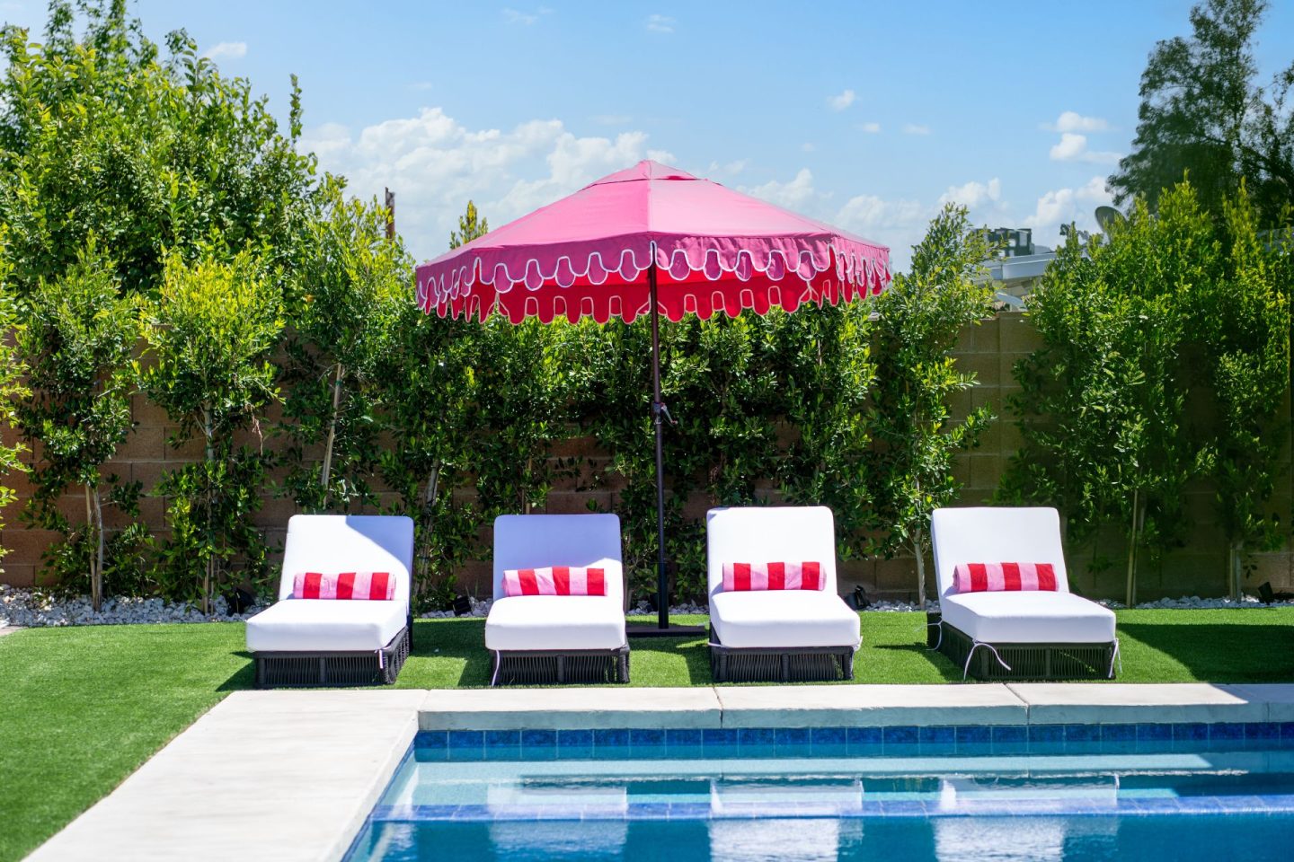 Arizona home decor, Outdoor poolside decor, Pretty pink scalloped umbrella, Black and white lounge chairs, Palm Beach vibe, Beverly Hills style, Affordable outdoor decor, Budget-friendly umbrella options, Desert oasis decor, Chic outdoor living, Poolside paradise, Desert landscape inspiration, Arizona outdoor living, Patio furniture ideas, Desert home makeover, Outdoor umbrellas, Patio umbrellas, Serena & Lily inspired umbrellas, Business & Pleasure inspired umbrellas, One Kings Lane inspired umbrellas, Stylish outdoor shade, Designer outdoor umbrellas, Chic patio decor, Luxury outdoor living, Trendy umbrella designs, Fashionable outdoor accessories, High-quality patio umbrellas, Premium outdoor shading solutions, Designer patio furniture, Elegant outdoor canopy options, scottsdale airbnb, scottsdale pool home airbnb, scottsdale arizona bachelorette party
